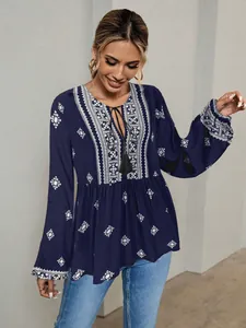 Elegant navy boho ethnic embroidered blouse for women with lantern sleeves and tassel ties