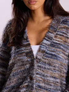 Detailed macro view of retro Maillard style plush V-neck cardigan with soft fuzzy texture