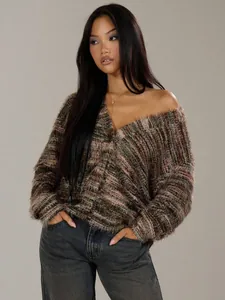 Model wearing a vintage deep V-neck shaggy plush cardigan in earthy Maillard colors