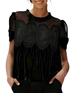 Detail of black velvet top with mesh yoke and lace embroidery