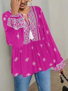 Vintage bohemian V-neck tassel blouse with white embroidery and lantern sleeves