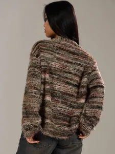 Macro detail of retro fuzzy long-sleeve cardigan with Maillard multicolored stripes