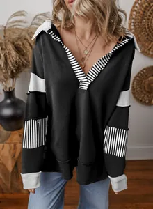 Detail view of deep V-neck striped patchwork loose sweatshirt for women's casual wear