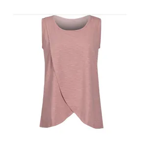 Detail of pink sleeveless nursing top with layered crossover front design for breastfeeding