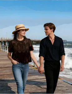 Elegant brown velvet mesh embroidered top with lace detailing worn at a beach pier