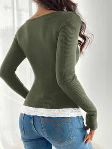 Back view of slim fit olive green ribbed long sleeve top with white lace hem detail