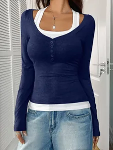 Slim fit navy blue long sleeve top with white halter fake two-piece design and buttons