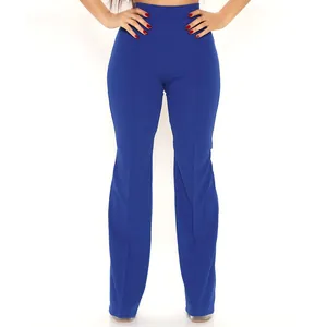 Detail view of stylish bright royal blue high-waisted flared trousers on a model