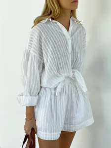 Elegant white striped set with bubble sleeve shirt and matching shorts for women lifestyle