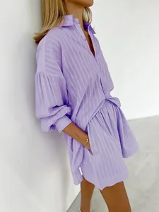 Detailed view of lavender striped shirt and shorts set with bubble sleeves texture