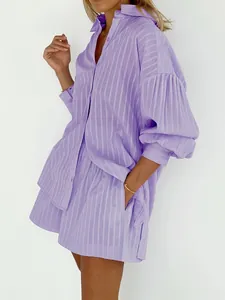 Close-up of purple striped puff sleeve shirt and matching shorts set for women