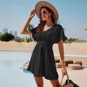 Elegant black V-neck pleated mini dress for summer beach vacation wear