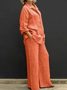 Completo casual arancione effetto lino con camicia e pantaloni larghi