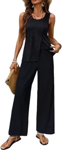 Full body view of women's black sleeveless tank top and wide-leg trousers outfit