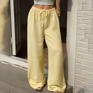 Pantalon large jaune à taille haute à la mode avec cordon de serrage élastique confortable.