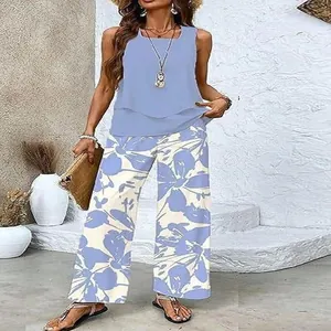 Chic summer 2-piece set featuring blue layered sleeveless top and floral print wide-leg trousers