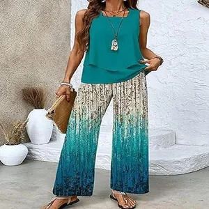 Detailed view of women's summer two-piece set with teal tank top and gradient pants.