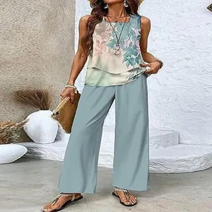 Detail of women's casual two-piece set with sleeveless floral tank and wide-leg trousers