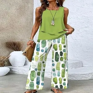 Detail of women's casual summer set with green sleeveless tank top and printed pants