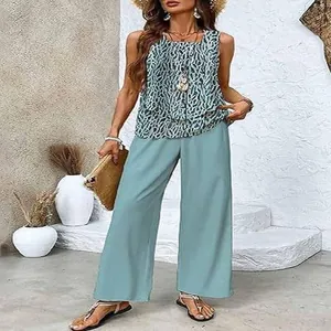 Detail of women's sleeveless double-layer patterned tank top and light blue wide-leg pants set