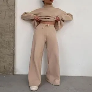 Elegant women's two-piece leisure set featuring turtleneck sweatshirt and wide-leg pants