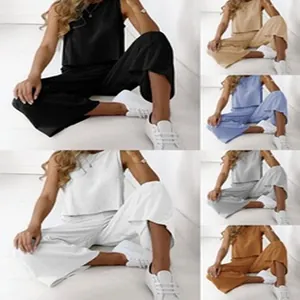 Women's casual two-piece set featuring sleeveless top and wide-leg trousers in multiple colors.