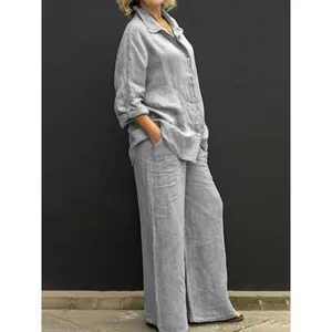 Casual grey two-piece set with long-sleeve button-down shirt and relaxed wide-leg trousers