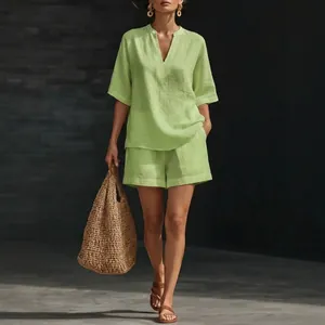 Two-piece lime green linen cotton set with V-neck top and casual shorts