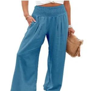 Detail view of blue smocked waist wide leg casual linen trousers for women