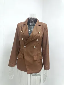 Detail view of brown slim fit women's blazer with silver buttons and notched lapel