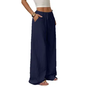 Women's casual navy blue textured wide-leg pants with drawstring waist and pockets