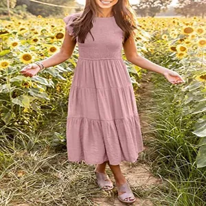 Bohemian dusty pink tiered midi dress with smocked bodice and cute flutter sleeves