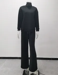 Fashionable black two-piece set featuring high-collar sweatshirt and loose wide-leg pants
