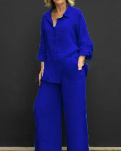 Bright blue casual two-piece set featuring a long sleeve shirt and wide-leg pants