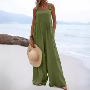 Women's summer olive green sleeveless loose jumpsuit with button straps for beach wear.