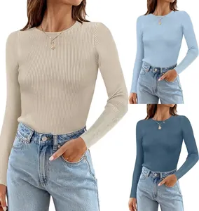 Detailed view of women's ribbed long-sleeve crewneck tops in multiple solid colors.