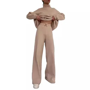 Fashionable women's two-piece leisure set with oversized turtleneck and wide-leg trousers