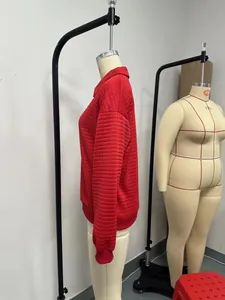 Detailed side view of red quilted collared sweatshirt for women on mannequin stand