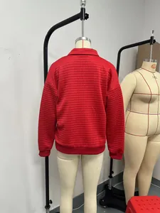 Back view of red quilted polo sweatshirt for women with long sleeves and grid texture