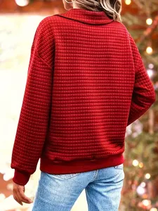 Back view of a red quilted sweatshirt for women featuring a stylish grid pattern texture