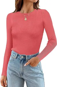 Detailed view of women's pink ribbed knit long sleeve top with round neck design