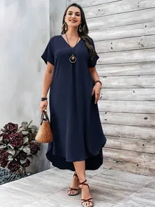 Casual plus size navy V-neck dress with asymmetrical hemline and short sleeves
