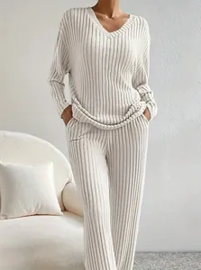 Detailed texture of the cream ribbed V-neck loungewear two-piece set for women