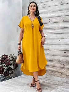 Full view of a vibrant yellow V-neck loose maxi dress for casual plus size women
