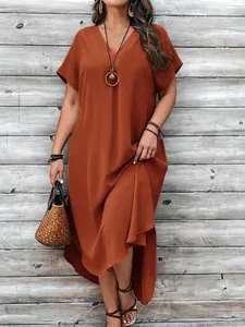Elegant V-neck burnt orange plus size bohemian maxi dress with asymmetrical hemline