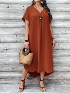 Fashion casual plus size burnt orange V-neck maxi dress for summer shown in lifestyle