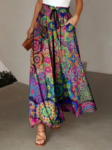Detailed macro view of vibrant Bohemian mandala digital print on flowing wide-leg pants