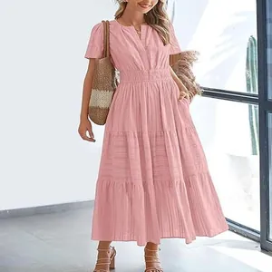 Elegant pink V-neck tiered maxi dress with short puff sleeves and elastic waist details