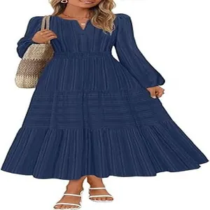 Navy blue V-neck tiered midi dress with long puff sleeves and cinched waist