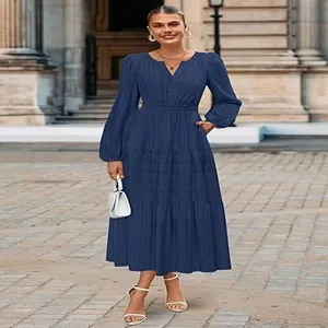 Full view of elegant V-neck tiered midi dress with stylish puff sleeves in deep blue